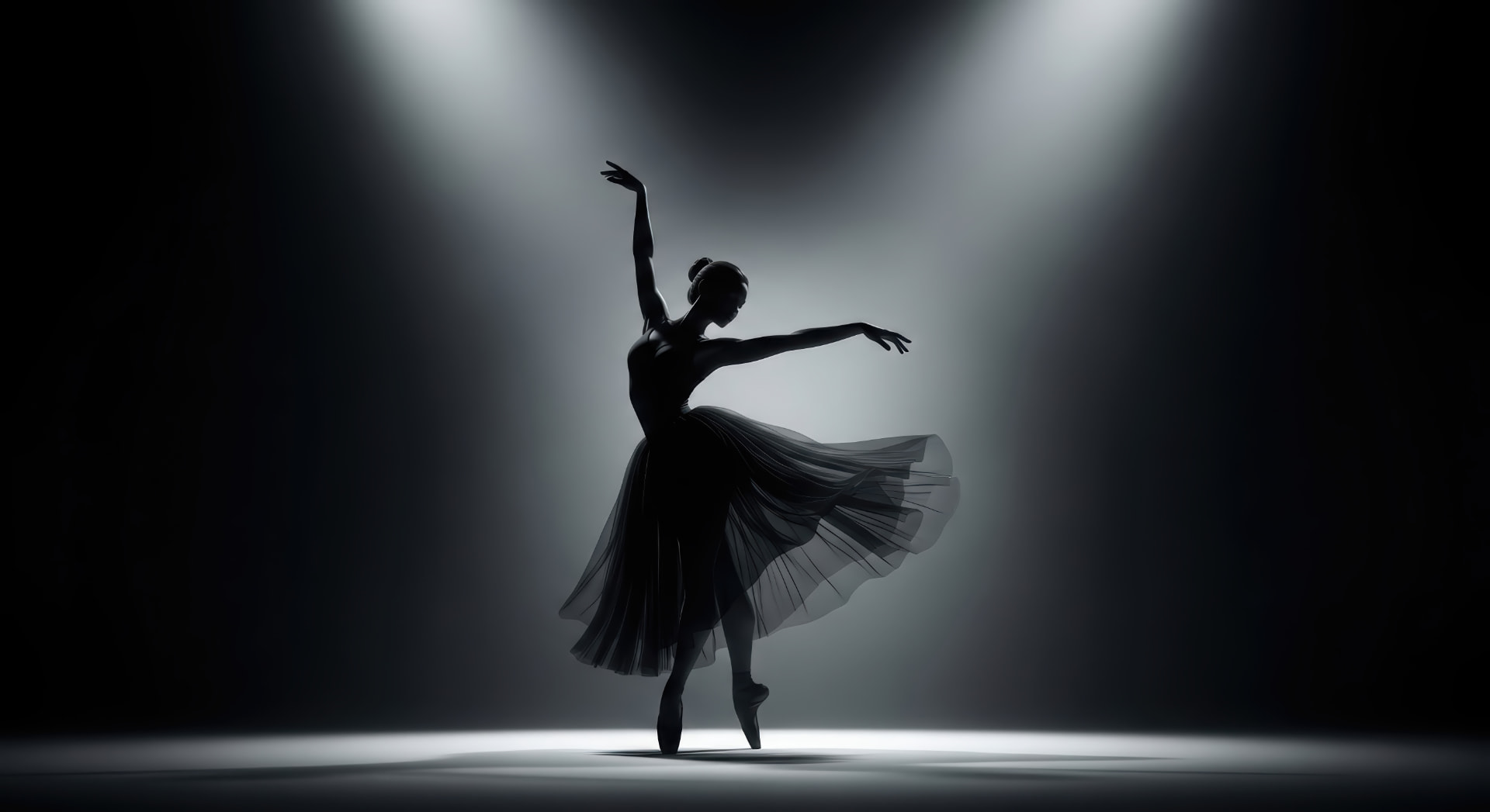 Ballet dancer silhouetted in stage light
